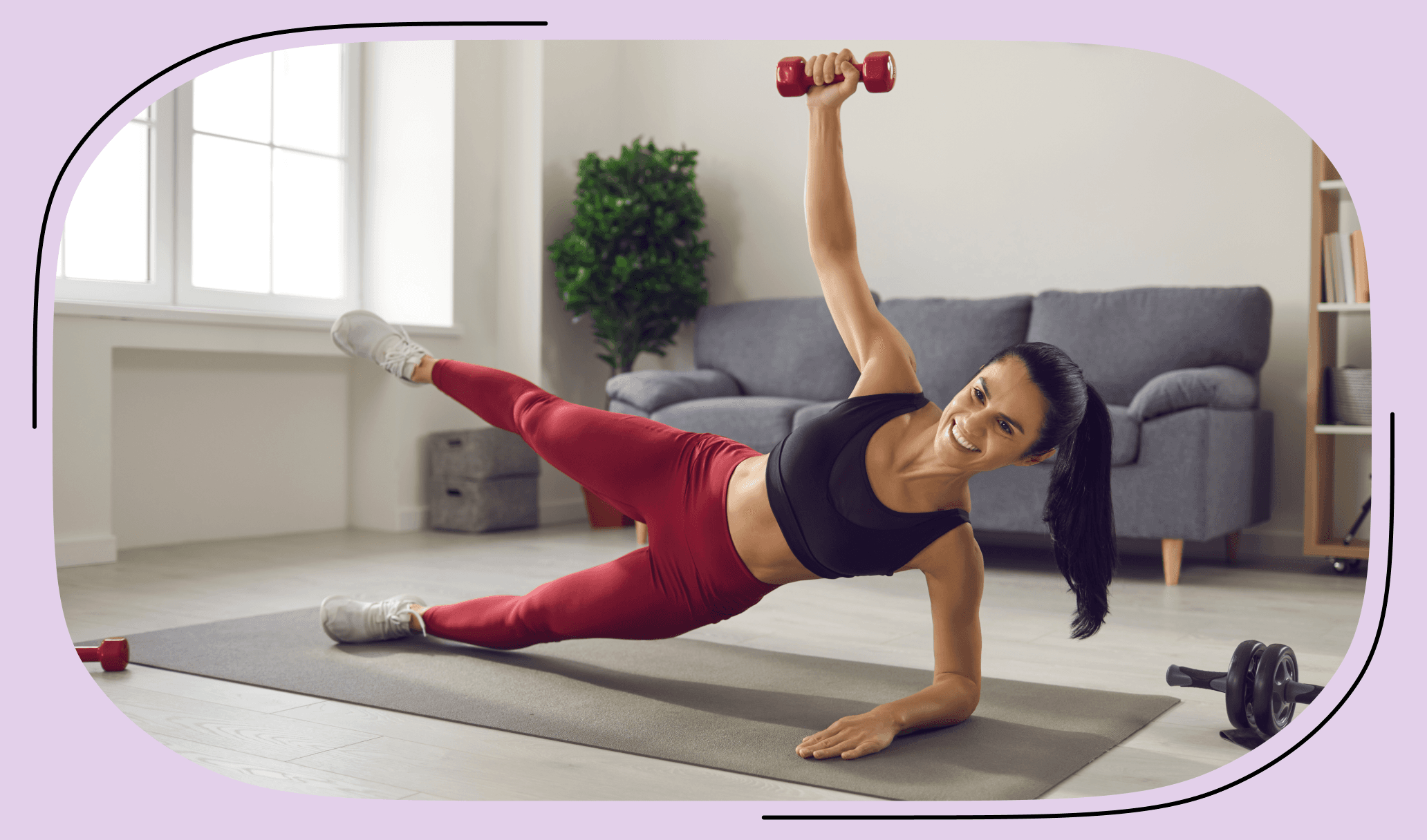 A woman performing side planks with leg lift holding dumbbells